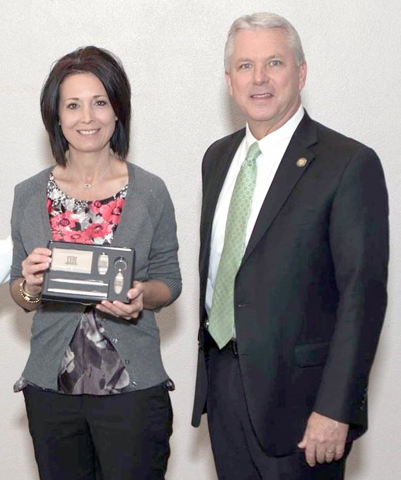 Photo provided by Northeastern State University Northeast Tech Instructor Becky Lamont (left), pictured here with Northeastern State University President Steve Turner, received the 2018 Outstanding Graduate Student Award at NSU&#x2019;s Ovation Awards on April 14.