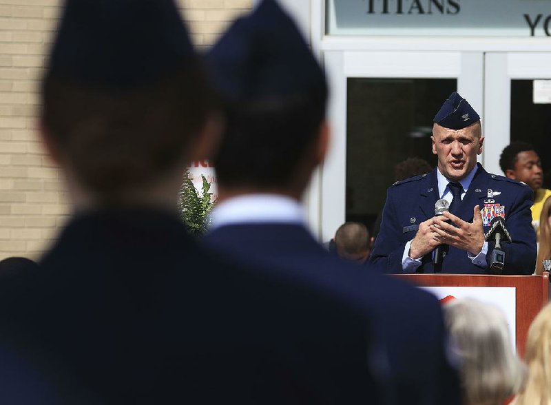 Col. Gerald Donohue, commander of the 19th Airlift Wing at Little Rock Air Force Base, speaks Monday at Jacksonville High School during a news conference announcing a startup grant for the school’s cybersecurity program. 
