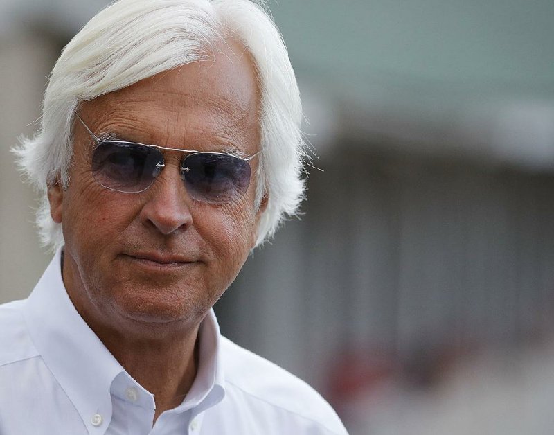 Trainer Bob Baffert looks out over his barn after morning workouts at Churchill Downs Friday, May 4, 2018, in Louisville, Ky.