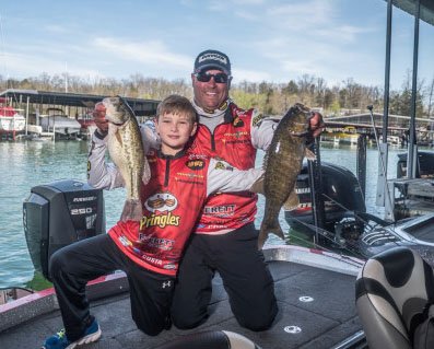 Greg Bohannan of Bentonville is enjoying success during his 11th year on the FLW Tour professional bass fishing circuit. His son, Brock, 9, is often at his dad’s side on the weigh-in stage at FLW tournaments. 