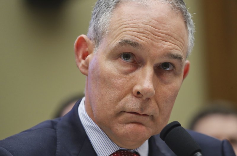 FILE - In this April 26, 2018 file photo, Environmental Protection Agency Administrator Scott Pruitt listen to questions as he testifies before the House Energy and Commerce subcommittee hearing on Capitol Hill in Washington. (AP Photo/Pablo Martinez Monsivais)