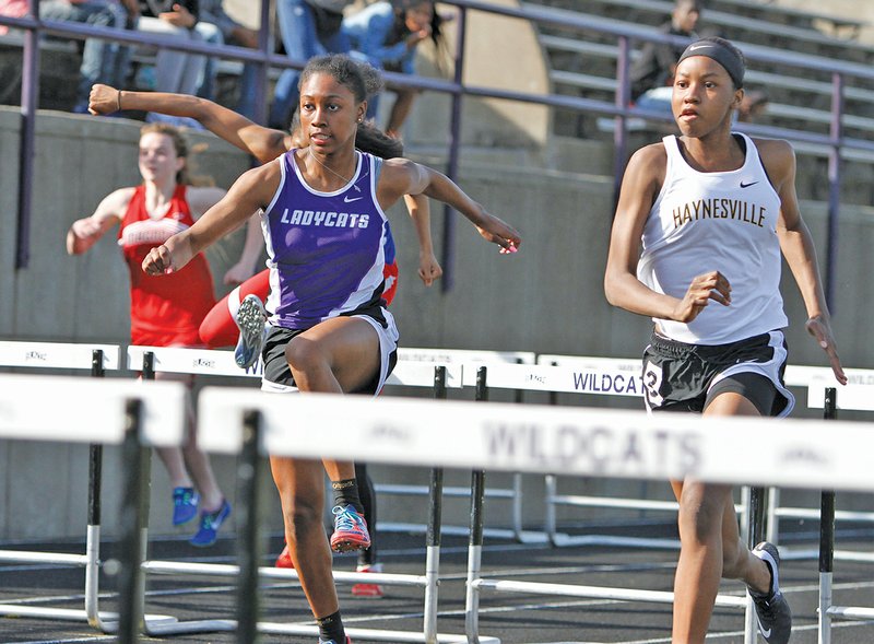 Terrance Armstard/News-Times El Dorado's Breya Clark competes in the 100 hurdles at the Oil Belt Relays this season at Memorial Stadium. Clark will compete in the Arkansas State Heptathlon, which begins today in Cabot.