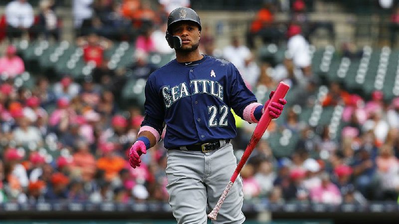 Seattle Mariners' Robinson Cano bats against the Detroit Tigers in the third inning of a baseball game in Detroit, Sunday, May 13, 2018. 