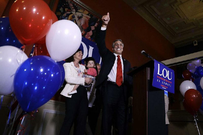 U.S. Rep. Lou Barletta, R-Pa., celebrates with supporters Tuesday night in Hazelton, Pa., after the ally of President Donald Trump declared victory in the GOP Senate primary. He will face the Democratic incumbent, Sen. Robert Casey Jr., in the fall.  