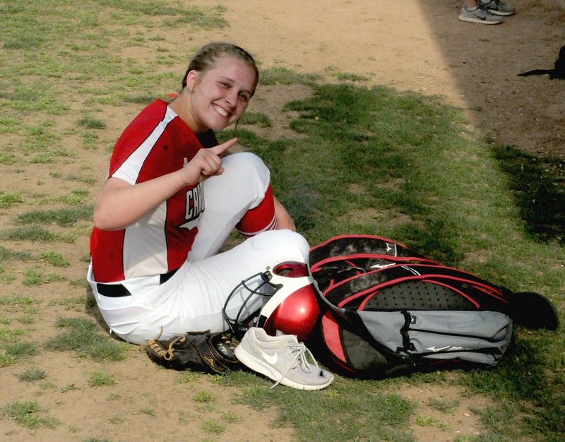 MARK HUMPHREY ENTERPRISE-LEADER Farmington senior outfielder Camryn Journgan gives a No. 1 sign following a state tournament win. The Lady Cardinals beat Magnolia 5-4 Thursday, Paragould, 7-0, Friday, and De Queen (8-3) Saturday to advance into this week's State 5A finals. The championship game will be played at 10 a.m. Saturday against Greenbrier at Benton High School.