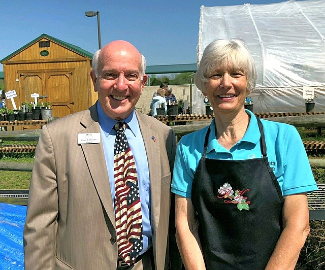 Photo Submitted Mayor Christie visits with Cathy Downard, Plant Sale Chairman, on the success of the BVGC's annual plant sale.