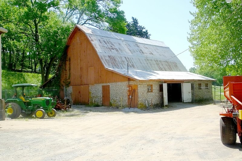 Lynn Atkins/The Weekly Vista The barn is all that remains of the farm where Bob Anderson grew up. It's now part of golf maintenance.