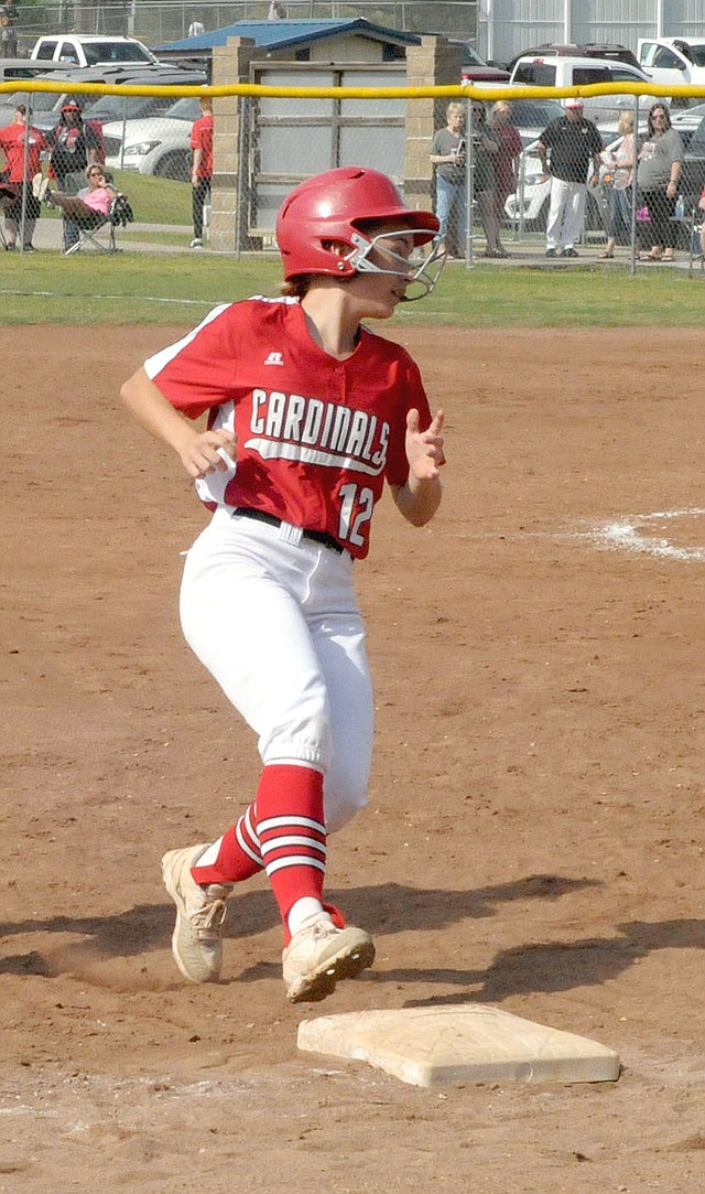 MARK HUMPHREY ENTERPRISE-LEADER Farmington sophomore Siana Sisemore comes into third base while pinch-running against Magnolia during Farmington's 5-4 Thursday win. Base running became a critical aspect of the game when the Lady Cardinals were forced to manufacture runs in a 7-0 quarterfinal win over Paragould Friday.