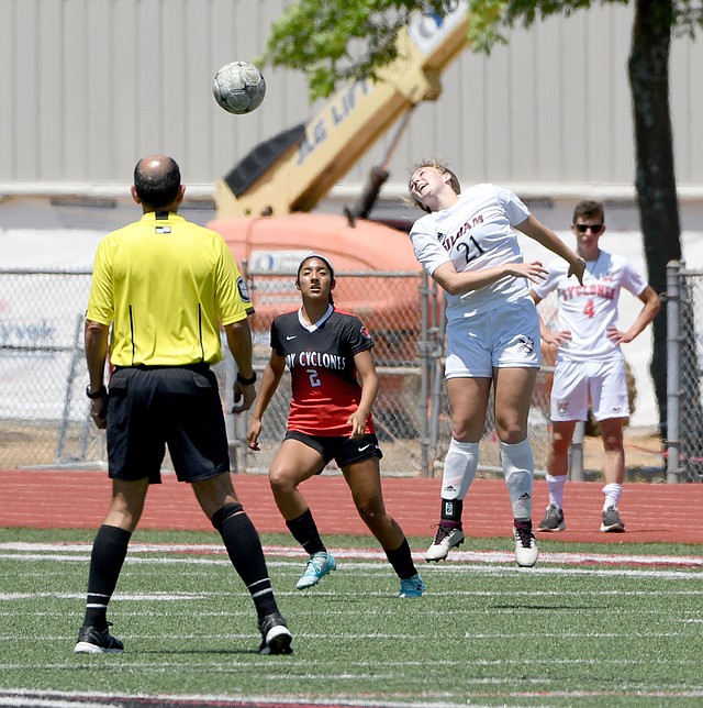 Bud Sullins/Special to Herald-Leader Siloam Springs junior Hailey Dorsey heads the ball during the Lady Panthers' match Friday against Russellville.