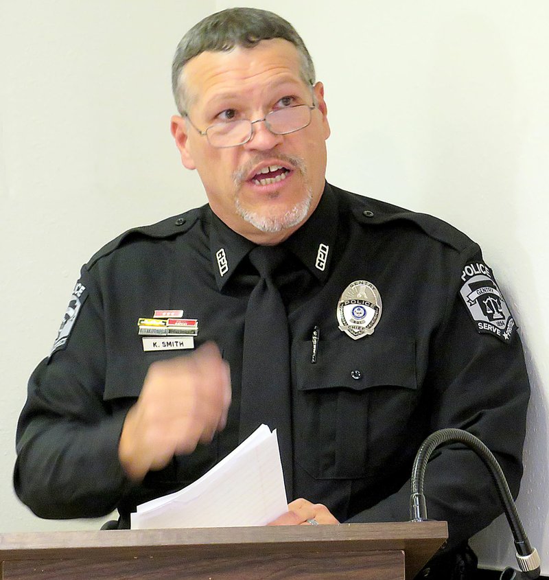 Westside Eagle Observer/RANDY MOLL Keith Smith, Gentry's police chief, addressed his officers and their families and gave out awards at a special ceremony at the police station on May 9.