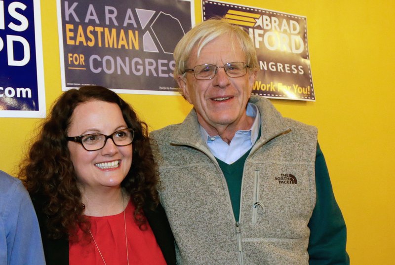 The Associated Press CHALLENGE: In this April 5, 2018, photo, Kara Eastman and Brad Ashford, two Democrats vying to challenge 2nd District House incumbent Don Bacon, R-Neb., pose for a photo in Omaha, Neb. Democratic and independent voters will pick one as the party's nominee in the Tuesday, May 15, primary election.