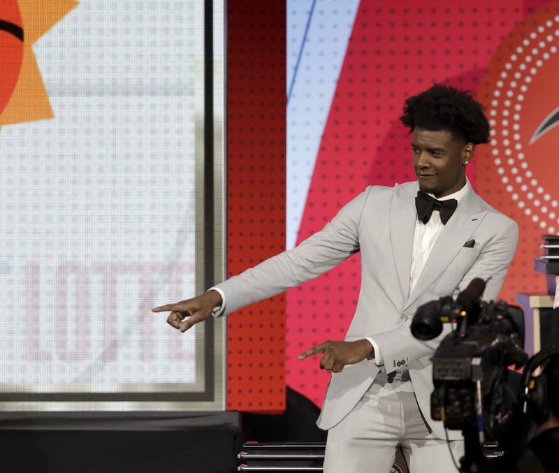 Phoenix Suns forward Josh Jackson reacts after the team won the first pick of the 2018 NBA Draft during the NBA basketball draft lottery Tuesday, May 15, 2018, in Chicago. (AP Photo/Charles Rex Arbogast)