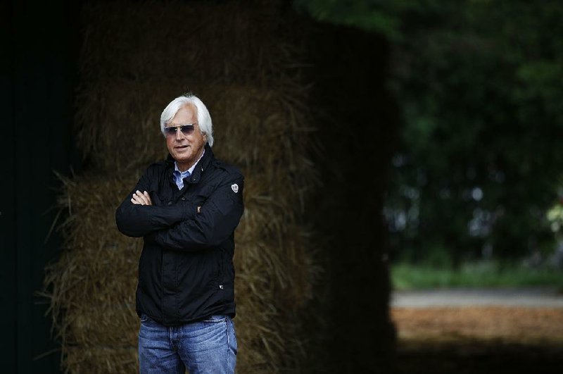 Bob Baffert, trainer of Kentucky Derby winner Justify, waits for Justify's arrival at Pimlico Race Course, Wednesday, May 16, 2018, in Baltimore. 