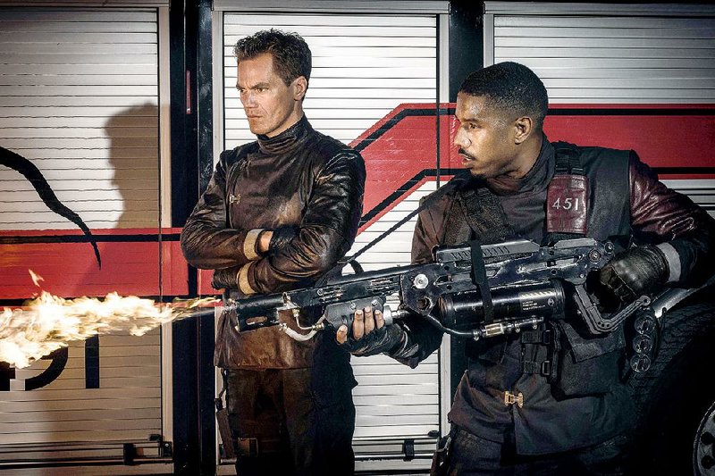 Fahrenheit 451, Ray Bradbury’s classic dystopian novel, has been adapted in a new film by HBO and stars Michael Shannon (left) and Michael B. Jordan as “firemen” whose job it is to burn all books. 
