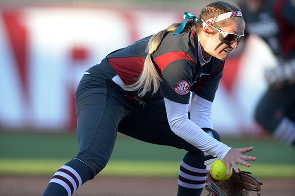 Arkansas third baseman Autumn Buczek fields a ball hit to the infield against Mississippi State Friday, March 30, 2018, at Bogle Park in Fayetteville.