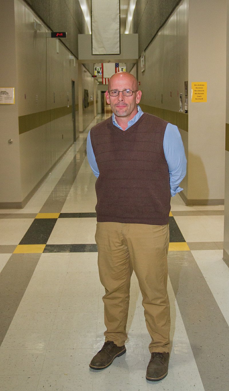 Brad Horn, the current Carlisle High School principal, stands in the hallway of the school. Horn was promoted to superintendent by the Carlisle School Board in January. Horn has worked at Carlisle for five years, going there from his hometown of Cabot.