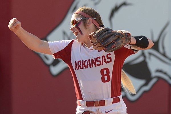 Arkansas third baseman Autumn Buczek celebrates Friday, May 18, 2018, after the final out of the Razorbacks' 2-0 win over DePaul at Bogle Park during the NCAA Fayetteville Softball Regional on the university campus in Fayetteville.