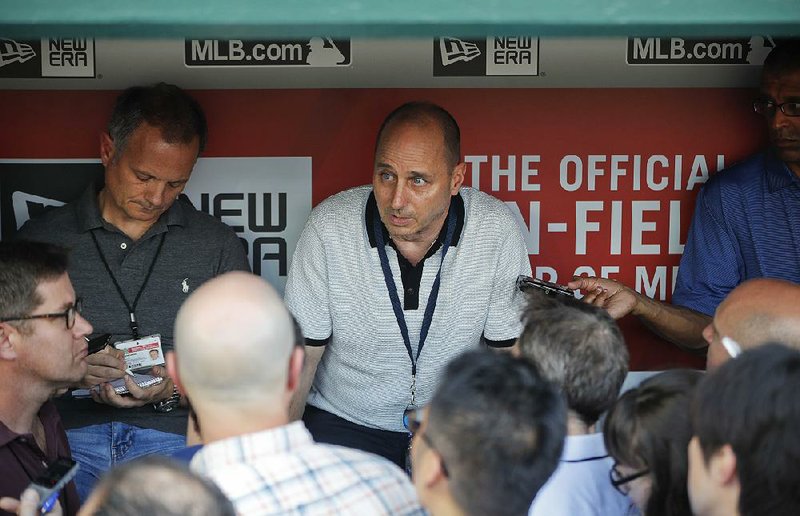 New York Yankees General Manager Brian Cashman said “an unfortunate set of circumstances” led the team to spend Wednesday night at Dulles International Airport in Dulles, Va.   