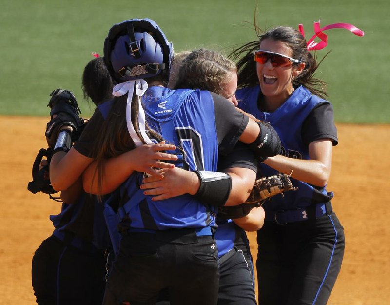 Taylor players celebrate after the final out in Friday’s 2-1 victory over Concord in the Class 1A softball championship game in Benton. It was the fifth state title for the Lady Tigers.  