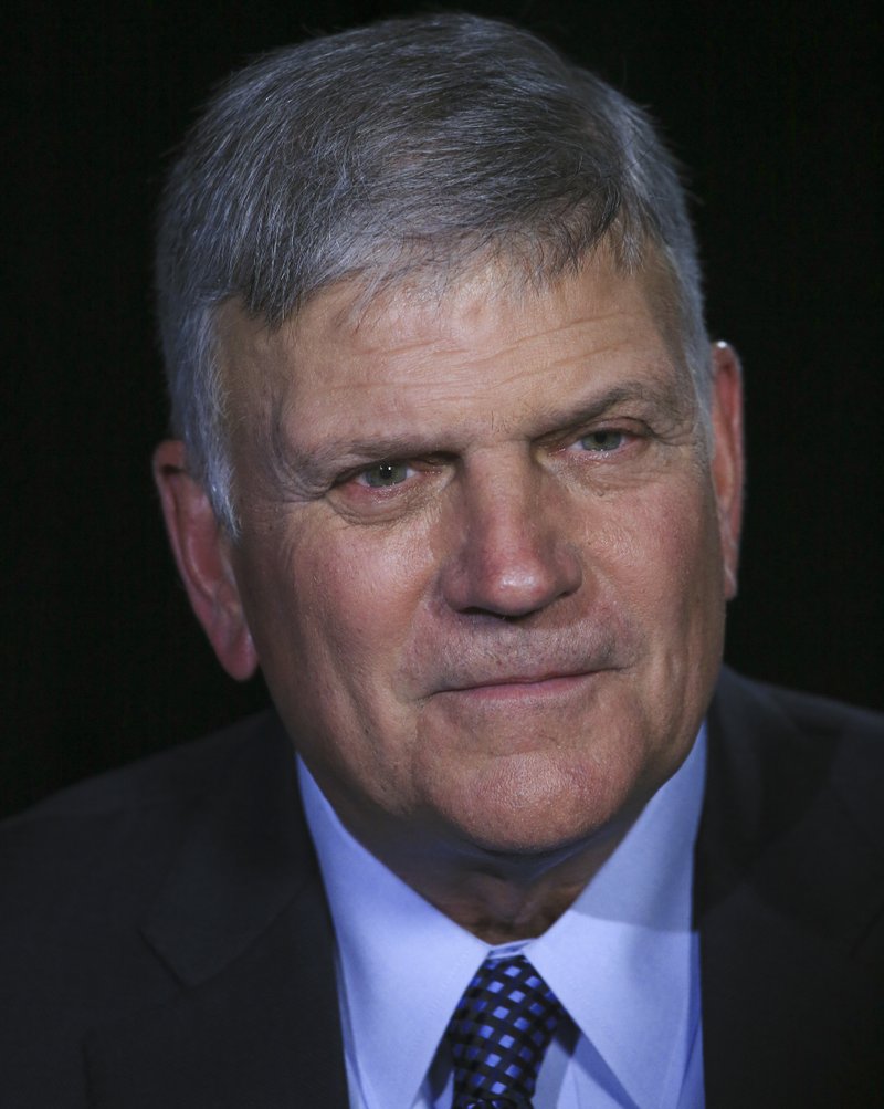 In this May 1, 2018, photo, the Rev. Franklin Graham listens during an interview about his latest book "Through my Father's Eyes," about his father the late evangelist Billy Graham in New York. Billy Graham's oldest son, Franklin, says his new book about his father is meant to share lessons he learned from the man known as "America's Pastor." (AP Photo/Bebeto Matthews)