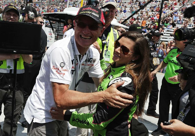 Danica Patrick is hugged by former Formula 1 driver Patrick Bourdais after she qualified for the Indianapolis 500 at the Indianapolis Motor Speedway on Saturday.  
