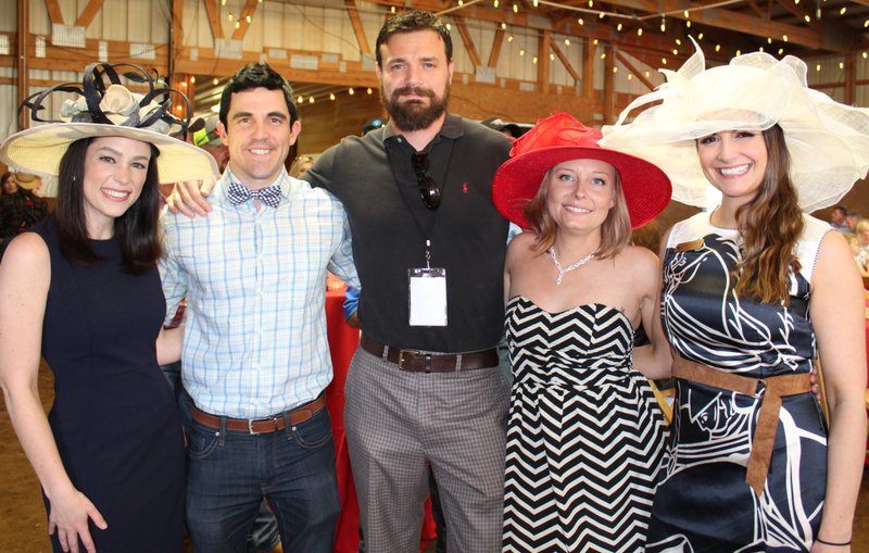 NWA Democrat-Gazette/CARIN SCHOPPMEYER Katelynn Zoellner and Jeff Larson (from left), Jake and Marisa Ladue and Shanna Dozier gather at the sixth annual Mini Derby to benefit Equestrian Bridges on May 5 at Parkerman Stables in Fayetteville.