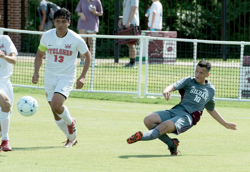Bud Sullins/Special to Siloam Sunday Siloam Springs forward Brian Andrade takes a shot in the first half of the 6A state championship game against Russellville. Russellville defeated the Panthers 4-1 to win the Class 6A championship.