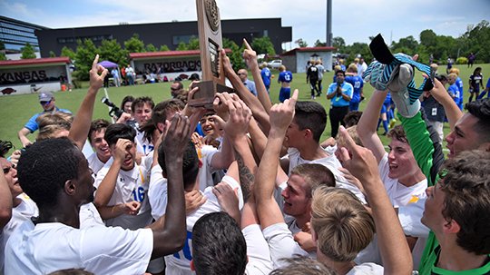 Special to The Sentinel-Record/Keith Bradshaw HARDWARE: The Lakeside Rams senior boys' soccer team celebrates Saturday at Razorback Field in Fayetteville after winning the program's first Class 5A state soccer title, 4-3, over Valley View.