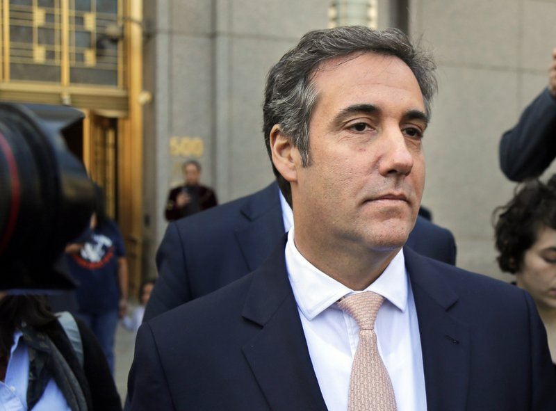 In this April 26, 2018 file photo, Michael Cohen leaves federal court in New York City. Criminal investigators are finally getting to study materials seized in raids on the home and office of President Donald Trump's personal lawyer, Cohen. Their ability to work with the results of the raid were delayed for weeks after attorneys for the attorney, Cohen, went to Manhattan federal court to get a role in deciding what should be subject to attorney-client privilege. (AP Photo/Seth Wenig, File)