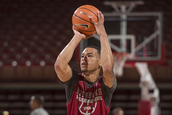 Khalil Garland takes part in practice Tuesday, Oct. 3, 2017, during Arkansas men's baskebtall media day at Bud Walton Arena in Fayetteville.