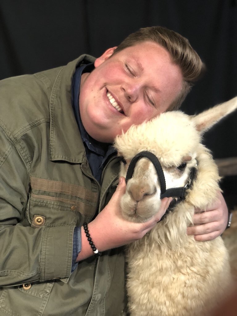 Noah Davis, 18, poses with the alpaca that "American Idol" adopted for him.