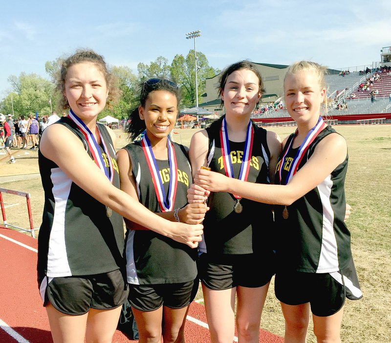 Submitted photo Prairie Grove's second place 4x800 relay team: Audrey Doering, Larisha Crawford, Alyssa LeDuc and Bekah Bostian came home with silver medals from the State 4A Track and Field Meet held May 1 at Pocahontas. Their time was 10:30.04.