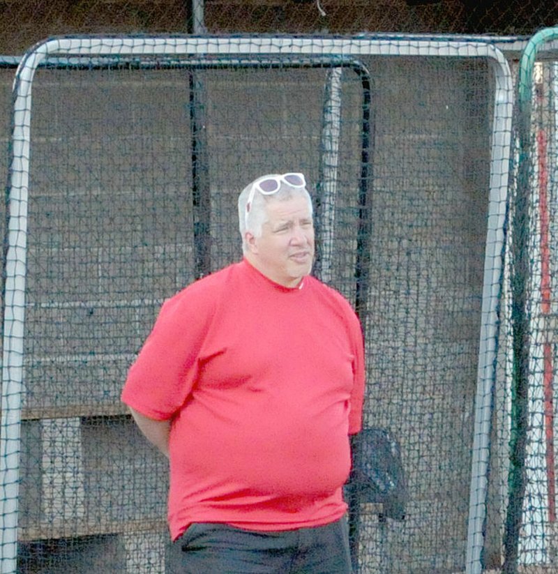 MARK HUMPHREY ENTERPRISE-LEADER Greg Squirrel, of Farmington, celebrated a decade of announcing state softball finals this past weekend. Squirrel, who announces Farmington home games, was on hand to introduce the Lady Cardinals in the Saturday's State 5A softball championship against Greenbrier played at the Benton Schools Athletic Complex at Benton.