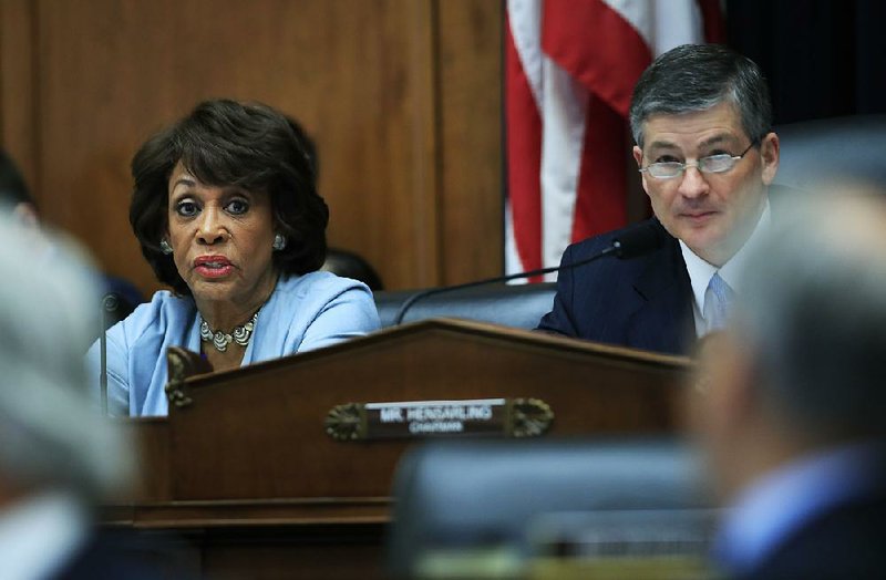 The House Financial Services Committee's ranking member Rep. Maxine Waters D-Calif., left, with committee Chairman Jeb Hensarling, R-Texas, speaks on Capitol Hill in Washington, Tuesday, May 2, 2017, during the committee's hearing on overhauling the nation's financial rules.  (AP Photo/Manuel Balce Ceneta)
