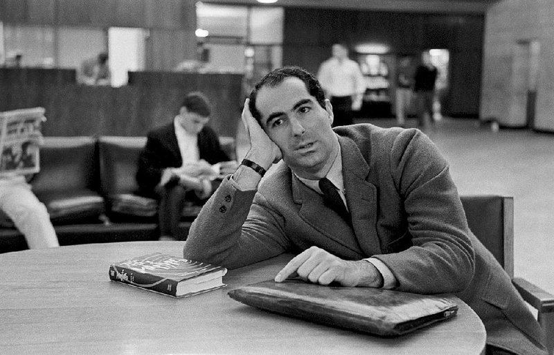 Philip Roth, at Princeton University (shown) in January 1964 and at his home in New York on Jan. 5, wrote dozens of works, some featuring a novelist named Philip Roth and others featuring an autobiographical stand-in, Nathan Zuckerman.