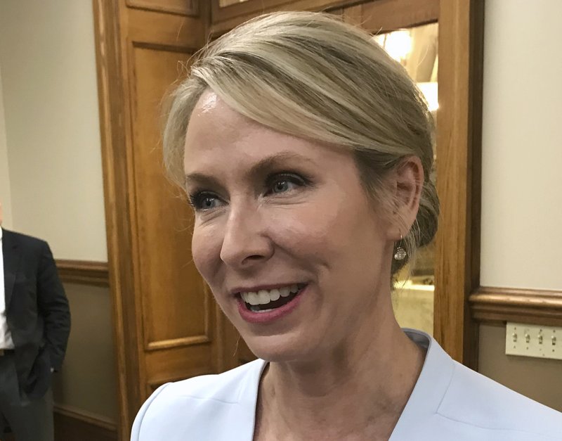 FILE - In this Friday, May 18, 2018, file photo, Arkansas Supreme Court Justice Courtney Goodson speaks to reporters at the Pulaski County Courthouse in Little Rock, Ark. Goodson and David Sterling, the chief counsel for the Department of Human Services, advanced to a runoff in the election for the nonpartisan state Supreme Court seat, Tuesday, May 22, 2018. (AP Photo/Andrew DeMillo, File)