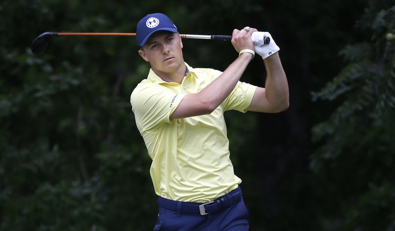 In this May 28, 2017, file photo, Jordan Spieth watches a tee shot on the sixth hole during the final round of the Dean &  DeLuca Invitational golf tournament at Colonial Country Club in Fort Worth, Texas. Spieth has always considered the Colonial a hometown event as well _ and has had much more success at Hogan's Alley than at the Byron Nelson.