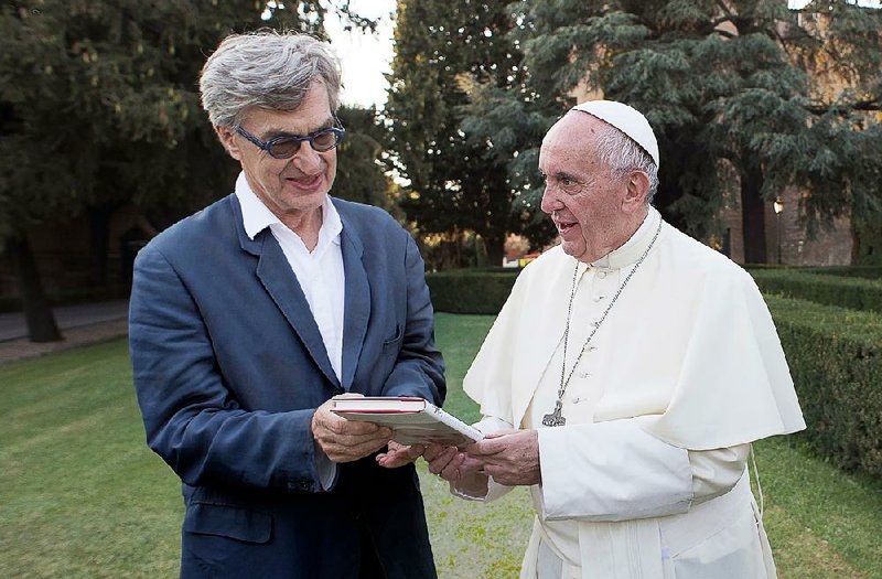 Director Wim Wenders (left) borrowed Errol Morris’ “Interrotron” technique to achieve the illusion of intimacy during the interviews with Pope Francis that compose the heart of the documentary Pope Francis: A Man of His Word. 