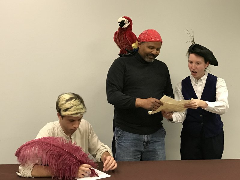 Courtesy Photo The large cast of Northwest Arkansas Audio Theater's "Treasure Island" will include actors Aaron Anderson as the adult Jim Hawkins, Amy Hardin as young Jim Hawkins and Ralph Sweatte as Long John Silver.