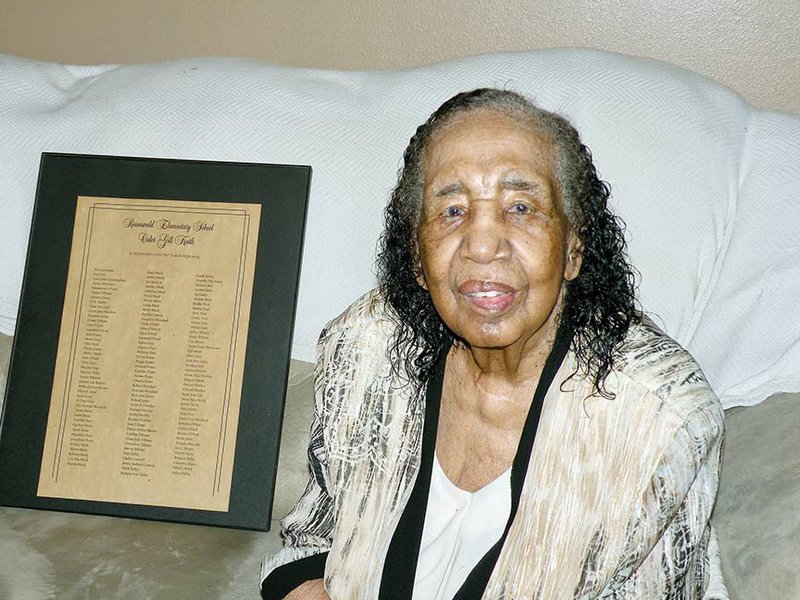 Culer Gill Keith began her 41-year teaching career at the Bigelow Rosenwald School when she was 18. She shows a plaque she received years later from former students, signed and given “In Appreciation for Our Sound Beginning.”