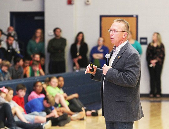 The Sentinel-Record/Richard Rasmussen STRESSING SAFETY: Mark Warren, vice president of Strategos International, speaks to a group of students at Lakeside School District Monday about school safety. Warren gave three presentations Monday to students and parents of the district. The FBI announced Wednesday a new campaign, #ThinkBeforeYouPost, to enlist the public's help in curbing hoax threats to schools and other public places.