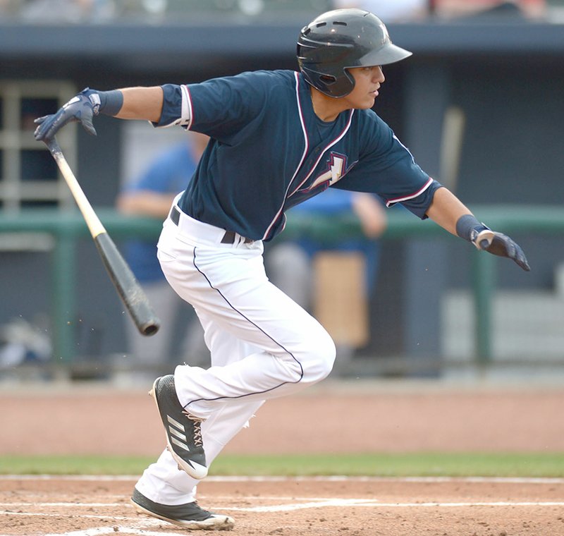 Northwest Arkansas shortstop Nicky Lopez runs to first base after making contact Friday against Midland at Arvest Ballpark in Springdale. Visit nwadg.com/photos for more photos from the game. 