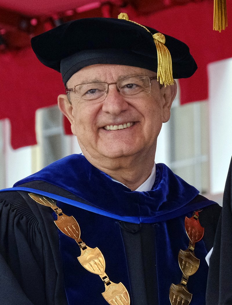 In this May 12, 2017 photo University of Southern California, university President C.L. Max Nikias presides at commencement ceremonies on the campus in Los Angeles. Nikias has agreed to step down amid a sex scandal involving a school gynecologist. (AP Photo/Richard Vogel)