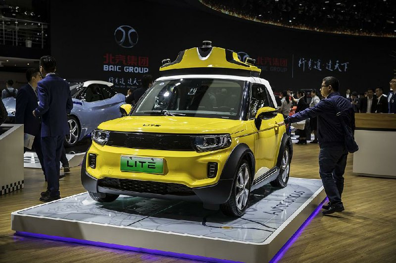 A BAIC Motor Corp. electric vehicle is displayed in April during the Beijing International Automotive Exhibition. 
