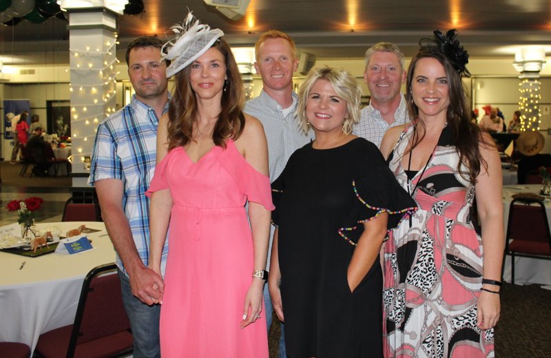 NWA Democrat-Gazette/CARIN SCHOPPMEYER Steven and Kelley Cullen (from left), Brad and Tanae Coleman, Michael Cullen and Stacie Cordell help support Arkansas Children's Northwest at the Circle of Friends Nite at the Races on May 5 at UARK Bowl in Fayetteville.