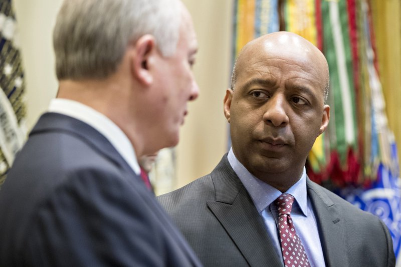 Marvin Ellison, chairman and chief executive officer of J.C. Penny Co., right, speaks with Greg Sandfort, chief executive officer officer of Tractor Supply Co., in the Roosevelt Room of the White House in Washington on Feb. 15, 2017. MUST CREDIT: Bloomberg photo by Andrew Harrer.