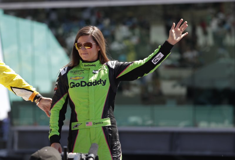 Danica Patrick waves as she's introduced before the start of the Indianapolis 500 auto race at Indianapolis Motor Speedway, in Indianapolis Sunday, May 27, 2018. (AP Photo/Michael Conroy)