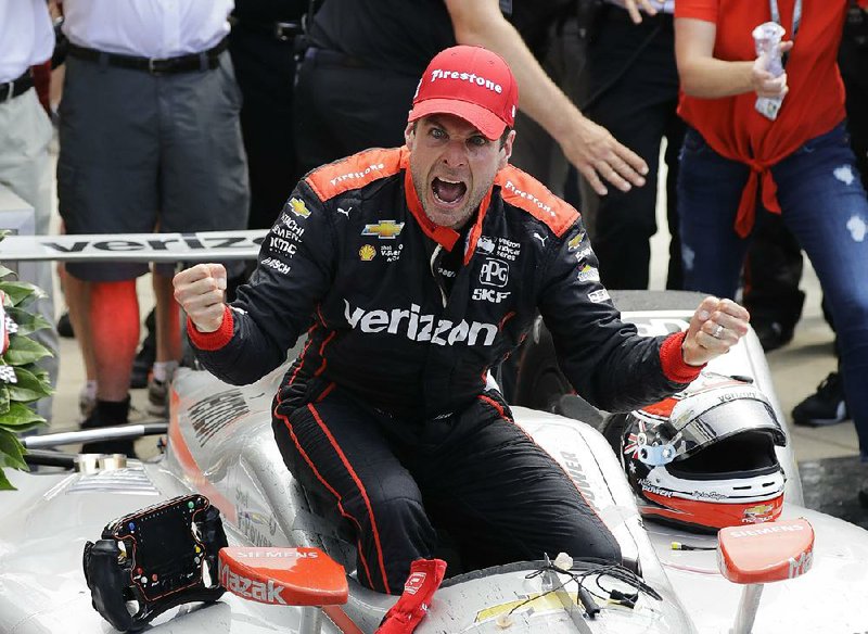Will Power celebrates after winning the Indianapolis 500 on Sunday at Indianapolis Motor Speedway. 