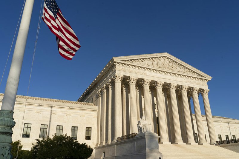 In this April 20, 2018 file photo, the Supreme Court is seen in Washington. The Supreme Court is allowing Arkansas to put in effect restrictions on how abortion pills are administered. Critics of a challenged state law say it could effectively end medication abortions in the state.  (AP Photo/J. Scott Applewhite)