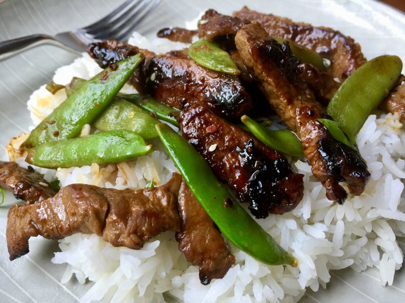 Sichuan-Style Orange Beef With Sugar Snap Peas and Rice
